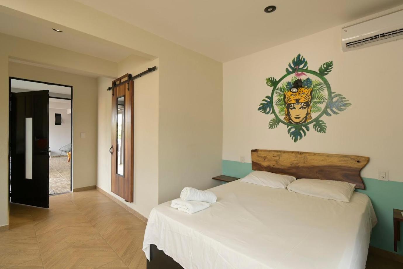 Coccoloba Guest House ปูแอร์โตเอสกอนดิโด ห้อง รูปภาพ