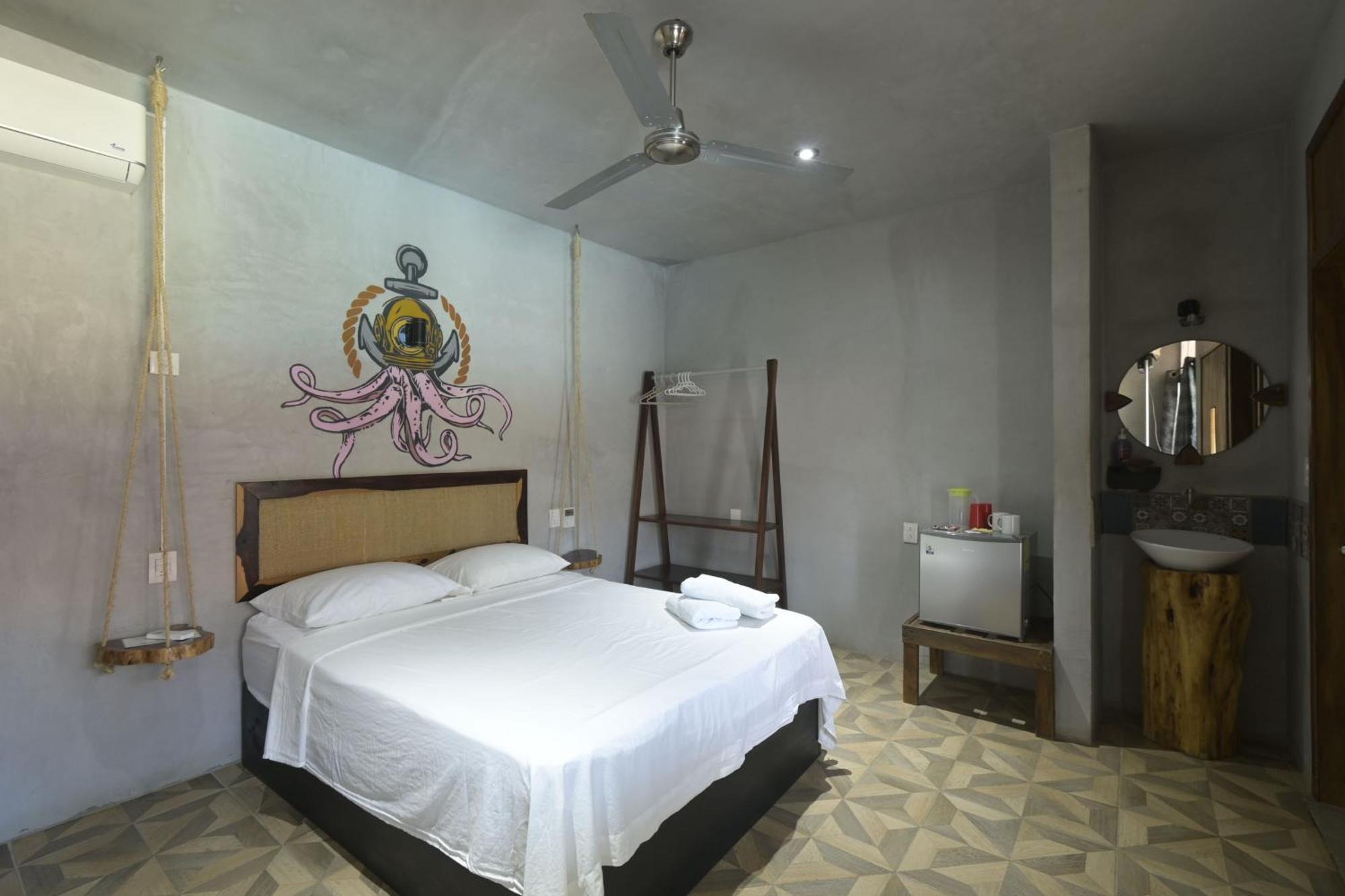 Coccoloba Guest House ปูแอร์โตเอสกอนดิโด ห้อง รูปภาพ